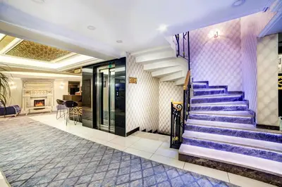 a set of purple stairs in a lobby at Ayasultan Hotel in Istanbul