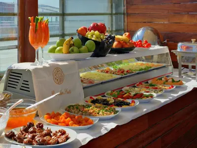 a buffet line with many different types of food at Burckin Hotel in Istanbul