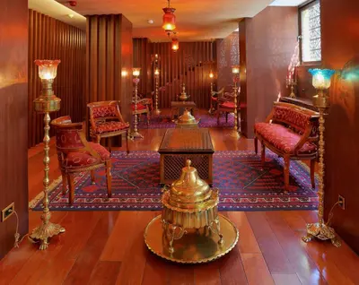 a living room with chairs and a table in a room at Burckin Hotel in Istanbul