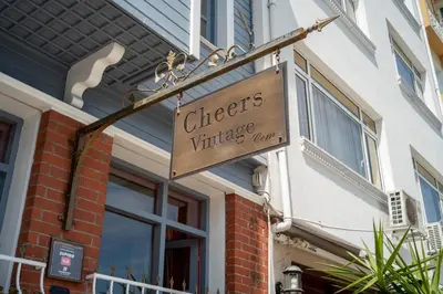 a sign in front of a building at Cheers Vintage Hostel in Istanbul
