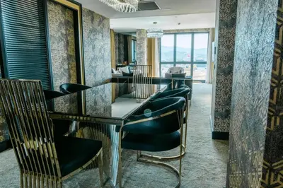 a dining room with a table and chairs at Hilton Garden Inn Yalova in Yalova