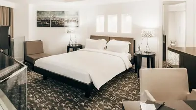 a hotel room with a bed and a television at The Elysium Taksim in Istanbul