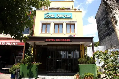 a hotel with a sign on the front of a building at Hotel Ipekyolu in Istanbul
