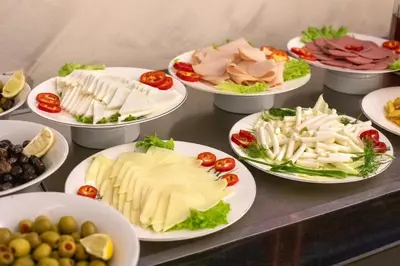 a bunch of plates of food on a table at Deluxe Newport Hotel - Old City in Istanbul
