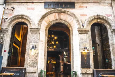 a store front of a hotel with three arched windows at West Pera Hotel in Istanbul