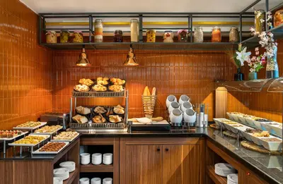 a bakery with many different types of bread and pastries at Aspera Hotel Altunizade in Istanbul