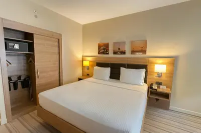 a bedroom with a bed and a desk in a room at Dosso Dossi Hotels & SPA Golden Horn in Istanbul