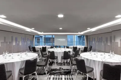 a conference room with white tables and chairs at Le Meridien Istanbul Etiler in Istanbul
