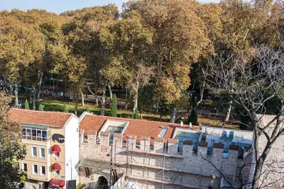 an aerial view of a building with trees in the background at Sirkeci Ersu Hotel & SPA in Istanbul