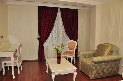 a living room with a couch and a table at Muyan Suites in Istanbul