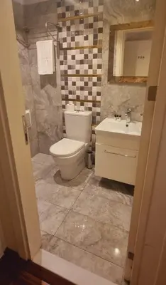 a bathroom with a toilet and a sink at By Historial Hotel Due in Istanbul