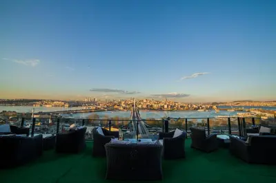 a view of a marina from the balcony of a restaurant at HHK Hotel in Istanbul