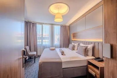 a hotel room with a large bed and a window at Best House Hotel OLD TOWN in Istanbul