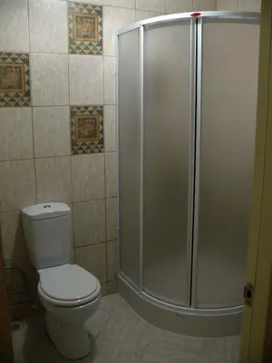 a bathroom with a toilet and a shower at Budak Residence in Istanbul