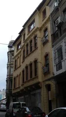 a building with cars parked in front of it at Budak Residence in Istanbul