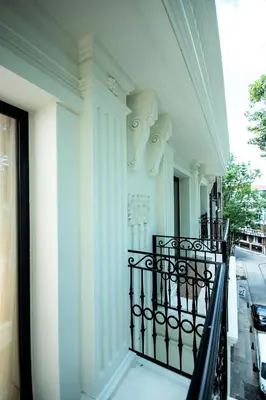 a balcony of a building with a black railing at Boss Hotel Sultanahmet in Istanbul