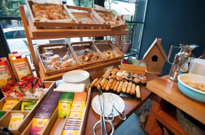 a table with a bunch of pastries and other food at Nomade Hotel Exclusive in Istanbul