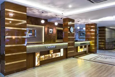 a bowling alley with a wooden wall at Formback Thermal Suit & Apart in Bursa