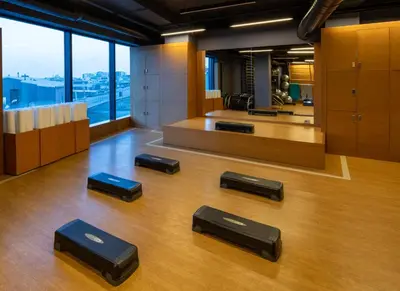 a row of stools on the floor of a room at Windsor Hotel & Convention Center Istanbul in Istanbul