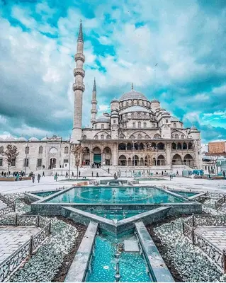 a large building with a mosque with a minaret at donat suites apartment in Istanbul