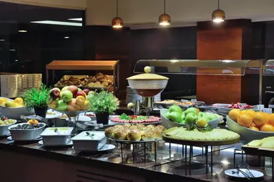 a buffet line with different types of fruits and vegetables at Tiara Thermal & SPA Hotel in Bursa