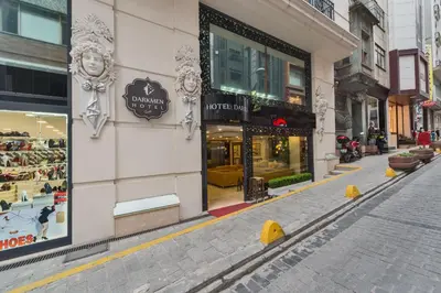 an empty street in a city with shops at Darkmen Hotel in Istanbul