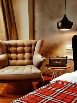 a living room with a couch and a table at SuB Karakoy - Special Category in Istanbul