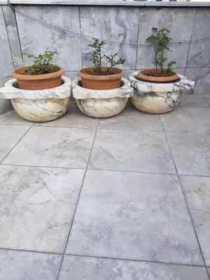 a group of four pots with plants in them at Seahouse Suites in Istanbul