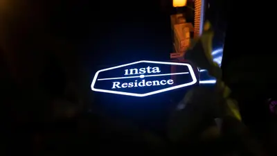 a sign that says india resistance is lit up at Insta Hotel Karakoy in Istanbul