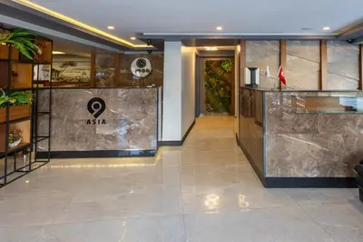 a lobby of a hotel with a reception desk at Asia Business Suites in Istanbul
