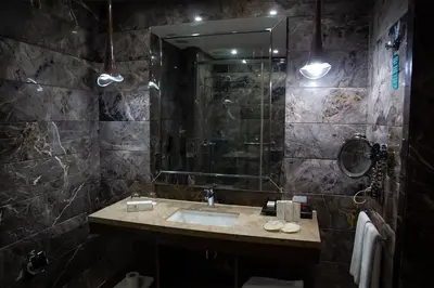 a bathroom with a sink and a shower at Gold Majesty Hotel in Bursa