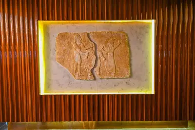 a picture of a piece of bread on a wall at Gold Majesty Hotel in Bursa