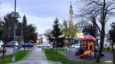 a playground with a slide in a park at Hotel Torun Istanbul Old City in Istanbul