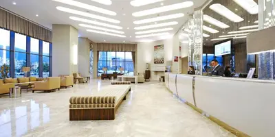 a lobby with a waiting area and a lobby at Crowne Plaza Bursa Convention Center & Thermal Spa by IHG in Bursa