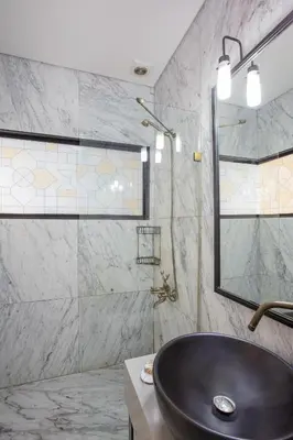 a bathroom with a sink and a glass shower at Nowy Efendi Hotel - Special Category in Istanbul