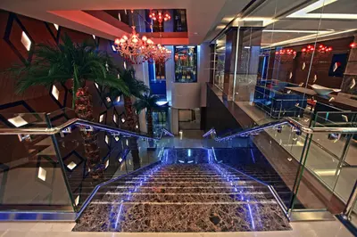 a staircase in a building with a water fountain at Ramada Plaza By Wyndham Izmit in Kocaeli
