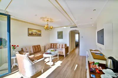 a living room with a couch and a table at Yılsam Sultanahmet Hotel in Istanbul