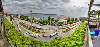 a street in a city with traffic on a road at Zimmer Bosphorus Hotel in Istanbul
