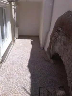 a shadow of a person walking down a hallway at Hagia Sophia Apartment in Istanbul