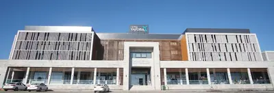 a building with cars parked in front of it at Hotel Yayoba in Tekirdag