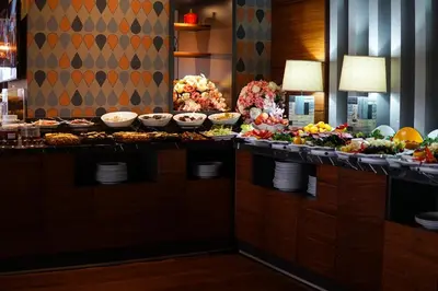 a buffet in a hotel with many plates of food at Hotel Yayoba in Tekirdag