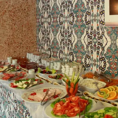 a buffet with many plates of food on a table at Ersari Hotel in Istanbul