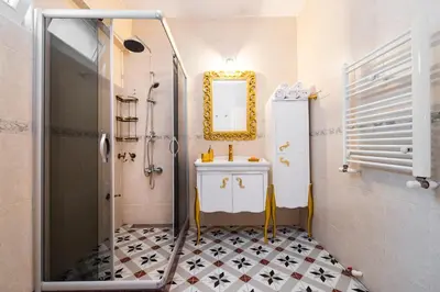 a bathroom with a sink and a mirror at Ajda Haus Nisantasi in Istanbul