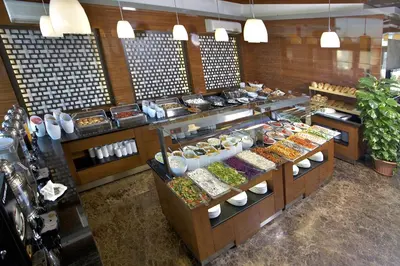 a buffet line with many different types of food at Monaco Hotel in Istanbul