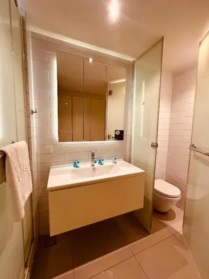 a bathroom with a sink and a toilet at Ortakoy Aparts in Istanbul