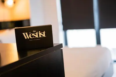 a book sitting on top of a table at The Westist Hotel & Spa - Special Category in Istanbul