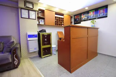 a office with a desk and a counter in a room at Istanbul Metro Hotel in Istanbul