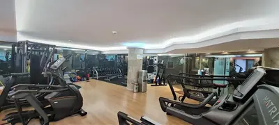 a gym with treadmills and ellipticals in a room at Tuzla Garden Hotel & Spa in Tuzla