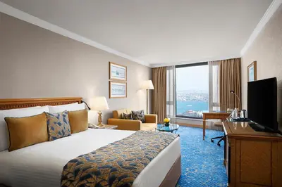 a hotel room with a bed and a television at InterContinental Istanbul by IHG in Istanbul