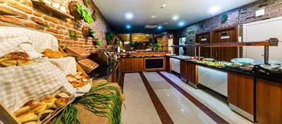 a kitchen with a counter with food on it at Aprilis Hotel - Special Category in Istanbul